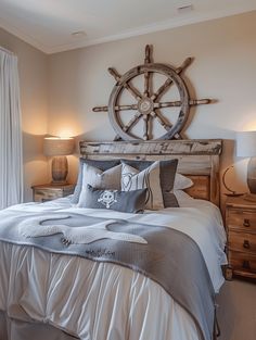 a bedroom with a large bed and wooden ship wheel on the wall