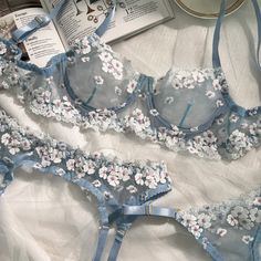 Material: This Blue Cherry Blossoms Sheer Lace 3pc Lingerie Set is made of 95% polyester 5% elastane. Color: Blue This lingerie set includes: Lace lingerie bra Lace lingerie thong/panties Lace lingerie garter belt Size: S, M, L *We recommend taking measurements before ordering lingerie. Different lingerie brands use different size charts, if you want the lingerie set to fit perfectly, please check the size chart below Details: Blue Cherry Blossoms Sheer Lace 3pc Lingerie Set includes matching br Blue Cherry Blossoms, Cute Lingerie Sets, Lingerie Garter Belt, Spring Lingerie, How To Be Irresistible, Lingerie Thong, Lingerie Blue, Blue Lace Bra, Vetements Clothing