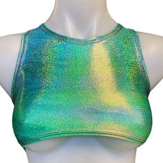 FESTIE BESTIE SEAFOAM HOLOGRAPHIC  Includes an sporty crop top with option of Underboob!  Holo fabric is a 4-way stretch polyester spandex blend, which fits tight and stretches to include a variety of body types. Fabric pattern can vary from item to item. Our products are made to order, please review our store policies before purchasing because refunds are not available after purchase. International shipping available. Listing is for top only Green Cropped Sporty Tank Top, Green Racerback Crop Top For Workout, Green Summer Crop Top For Gym, Green Cropped Tank Top For Workout, Fitted Green Crop Top For Workout, Green Cropped Sports Crop Top, Green Fitted Racerback Crop Top, Fitted Green Racerback Crop Top, Green Cropped Sports Bra For Workout