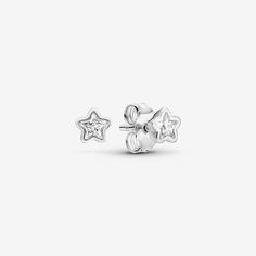 Take your style cues from the stars with these dainty stud earrings. Made from sterling silver, they're set with star-shaped clear stones for a twinkling effect. The versatile pair works equally well with casual, daytime looks — worn together, alone or as part of a stack – as well as subtle adornments on special occasions. Available in-store and online. - Pandora Sparkling Sterling Silver Star Stud Earrings - Sterling silver / Cubic Zirconia / Clear Pandora Earrings Studs, Pandora Star, Smart Gift, Sparkling Stars, Dainty Studs, Star Earrings Stud, Jewellery Uk, Clear Stone, Star Studs