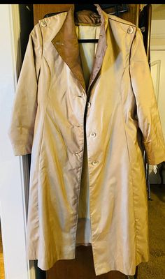 Long brown women's vintage coat  , has a darker brown collar . Does say size 10 but it runs a bit smaller , measurements for chest are in pictures . I do have matching belt , both side loops are detached from the bottom as well as the tag by the collar is removed and there's a rip . I can fix but sometimes vintage items are left better alone . Please inspect all pictures. thank you . Formal Long Brown Outerwear, Vintage Brown Long Sleeve Outerwear With Buttons, Retro Brown Long-sleeved Outerwear, Vintage Brown Long Coat, Vintage Brown Long-sleeved Hooded Jacket, Vintage Brown Single-breasted Long Sleeve Outerwear, Better Alone, Long Coat Women, Best Friend Love