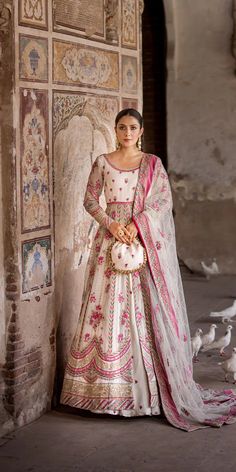 Latest Pakistani Wedding Dress in Open Frock Lehenga Style comes in premium quality fabric. This Lehenga Dress is a perfect balance of trend and tradition. Embroidery and floral designs make this Pakistani Dress an epitome of beauty and your priority to have a magnificent look. Transitional Georgette Lehenga With Floral Embroidery, Semi-stitched Maxi Lehenga With Intricate Embroidery, Traditional Drape Gown With Floral Embroidery For Reception, Floral Embroidered Gown With Traditional Drape For Reception, Gown With Floral Embroidery And Traditional Drape For Reception, Floor-length Anarkali Sharara With Floral Embroidery, Wedding Floor-length Dress With Floral Embroidery, Wedding Dresses With Floral Embroidery, Floor-length, Floor-length Wedding Dress With Floral Embroidery