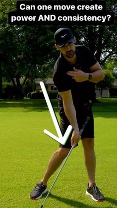 a man standing on top of a green field holding a golf club