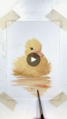 someone is painting a duck in the water