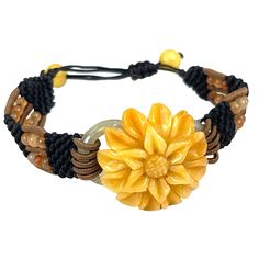 This unbranded yellow jade bracelet is expertly hand-carved and hand-knotted, offering an adjustable size to ensure a perfect fit. The bracelet exudes a unique charm, making it an ideal accessory for women who appreciate artisanal craftsmanship. * Yellow jade bracelet * Hand-carved and hand-knotted * Adjustable size, interior opening 3 inch * Ideal for women * Crafted from jade and cord Features: * Adjustable, Handmade, Stone, Carved Size: Womens Interior opening 3 inch, adjustable Condition: Pr Traditional Adjustable Jade Bracelets, Traditional Adjustable Jade Bracelet, Spiritual Carved Beaded Bracelets, Adjustable, Spiritual Carved Beaded Bracelets, Yellow Beaded Bracelets With Sliding Knot As Gift, Adjustable Carved Beaded Spiritual Bracelets, Adjustable Carved Beaded Bracelets For Spiritual Style, Yellow Beaded Bracelets With Sliding Knot For Gifts, Yellow Beaded Bracelet With Sliding Knot As Gift