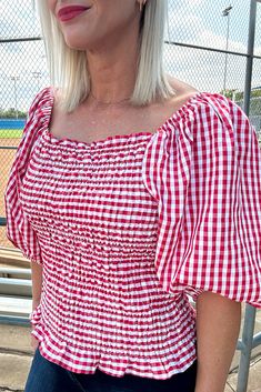 Women's Checkered Square Neck Smocked Top with Puff Sleeves in Red and White This elastic smocked top is the perfect mix of sass and sophistication, made up of a trendy checkered pattern, with a square neck, and irresistible puff sleeves. Get this amazing piece and you'll be the queen of fashion! Details Available in sizes S - L 1 Color Option Elastic Smocking Detail Square Neck with Elastic Band Detail Puff Sleeves Sizing Small: 2/4, Medium: 6/8, Large: 10/12 Fit "Model" is 5'3", 125-130lbs dep Top With Puff Sleeves, Blouse Fits, Checkered Blouse, Bow Headband Hairstyles, Long Sleeve Outerwear, Smock Top, Smocked Top, Grey Denim, Knit Shorts