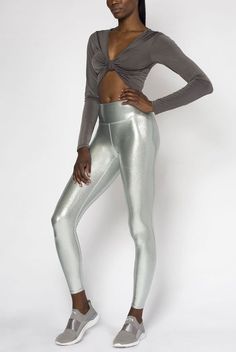 Description: Full length legging. Fitted. Supportive high rise waistband, for a comfortable fit that smooths and flatters. Approx. 3" waistband. Power mesh lining at waistband, for comfort & breathability. Moisture wicking. 4-way stretch. Breathability. Reinforced gusset. Flatlock seams, to prevent chafing and add durability. Smooth performance fabric. Made in the USA. Why We Love: Love the chic metallic finish & supportive waistband!Fabric: 80% Nylon, 20% Spandex. Care: Machine wash cold, insid Shiny Nike Leggings, Shiney Leggings, Glossy Leggings, Leggings Metallic, Iridescent Fabric, Cupro Fabric, Feel Powerful, Velvet Tank, Spandex Leggings