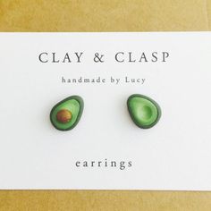 an avocado shaped earrings with the words clay and clasp