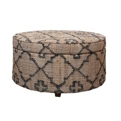 a round ottoman with an intricate pattern on it