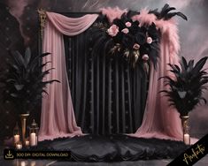 a black and pink stage set up with flowers, feathers and candles in front of it