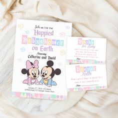 two mickey and minnie mouse birthday cards on top of a white bed with the words,'you are the happiest baby shower on earth '