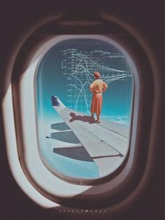 an airplane window with a person standing on the wing