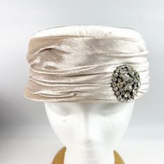 NWT Vintage 1960s The Emporium Pillbox Hat Ivory Satin Rhinestone Brooch 22". Retail tag still attached to the inside. Item is new. Please see photos for details. Vintage Cream Hat For Evening, Pillbox Hat, Pill Boxes, Rhinestone Brooches, Vintage 1960s, Caps Hats, Accessories Hats, 1960s, Emerald