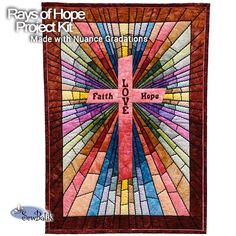 a quilted wall hanging with the words faith, hope and hope written on it