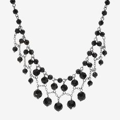 This vintage inspired, jet black beaded, hematite-tone necklace channels pure decadence. Polished hematite tone links are strewn with a graduating pattern of onyx black color beads.Bead Type: GlassJewelry Closure: Lobster ClaspMetal Color: Silver ToneChain Length: 16 InchExtender Length: 3 InchChain Construction: BeadCare: Wipe CleanMetal: AlloyNecklace Type: Beaded NecklacesCountry of Origin: Imported Black Necklace With Spacer Beads For Party, Black Hematite Beaded Necklaces With Round Beads, Black Hematite Beaded Necklaces, Black Hematite Jewelry With Spacer Beads, Black Faceted Beaded Necklaces For Party, 1928 Jewelry, Black Beads, Jewellery And Watches, Onyx