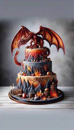 a three tiered cake with a red dragon on top and decorations around the edges