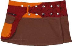 A 12 inches short mini skirt in an earthy tone of brown with a fanny pack on the belt matched with a contrasting spicy mix of orange and crimson red. Ready to go hands-free, you do not need to worry about carrying a purse because it comes with a zip purse attached on the pouch pocket on the side useful for carrying small items - from keys and cash to credit card. #tlb #WrapAroundSkirt #Pocket #Solid #alineminiskirt #spicymixsolidcolors #fannypack #waistpocket Fitted Brown Mini Skirt With Belt Loops, Trendy Brown Cotton Mini Skirt, Short Mini Skirt, Wrap Shorts, Hippie Look, Buy Skirts, Zip Purse, Button Skirt, Wrap Mini Skirt