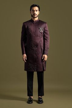 Plum purple full sleeves achkan with mystic cut dana swerve thread and maal embroidery on one side. Paired with a black trouser. - Aza Fashions Fall Season Fitted Long Sleeve Sherwani, Designer Long Sleeve Bandhgala For Fall, Fitted Fall Wedding Kurta, Designer Wear Long Sleeve Bandhgala For Fall, Fitted Kurta With Zari Work For Fall, Fitted Fall Kurta With Zari Work, Fall Bandhgala With Long Sleeves, Fall Fitted Kurta With Zari Work, Fall Wedding Bandhgala With Zari Work