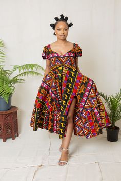 This beautiful African print dress is the perfect dress to make a statement. This dress will make you the cynosure of all eye. Suitable to wear for dinners, dates, hangouts, movies, weddings and anywhere you will love to stand out. Made with 100% African wax cotton Care instructions  Wash with mild soap, do not bleach Knee-length Printed Sundress, Multicolor Print Knee-length Dress For Vacation, Knee-length Multicolor Print Dress For Vacation, Multicolor Print Knee-length Vacation Dress, Black Abstract Print Dress For Vacation, Black Dress With Abstract Print For Vacation, Knee-length Multicolor Print Vacation Dress, Bohemian Knee-length Printed Midi Dress, Patterned A-line Printed Dress