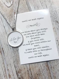 a necklace with a poem written on it