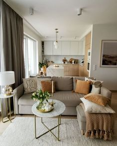 a living room filled with furniture and decor