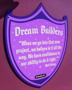 a sign on the side of a building that says, dreambulbers when we go into that new project, we believe it all the way we have confidence in our ability to do it right