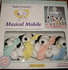 a package of stuffed animals in the shape of musical mobiles for babies to play with