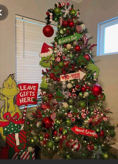 a christmas tree decorated with red and green ornaments