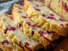 slices of cranberry bread on a cutting board