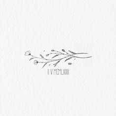 the logo for iv mmmoxx is shown in black and white, with flowers on it