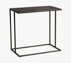 an iron and wood side table against a white background