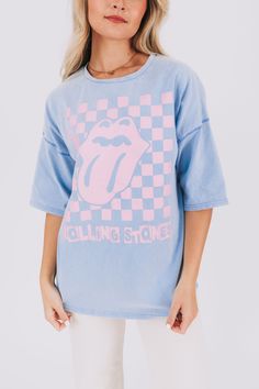 Rock out in style with the Rolling Stones Checker Tee! Featuring a bold graphic and eye-catching checkered pattern, this tee will have you turning heads. Plus, the oversized fit adds both comfort and edginess to your wardrobe. Get ready to rock and roll (literally) with this unique and playful tee. Details Rolling Stones graphic Checkered pattern Oversized fit Sizing Approximate measurements: SIZE LENGTH BUST Small 29" 50" Medium 29" 52" Large 30" 54" Fabric has stretchModel is 5’9 wearing small Material 100% CottonWash with similar colorsHang dry 80s Graphic Tees, Megan Outfit, Choir Shirts, Sza Concert, Graphic Design Shirt, School Clothes, Checkered Shirt, L And Light, Carolina Blue