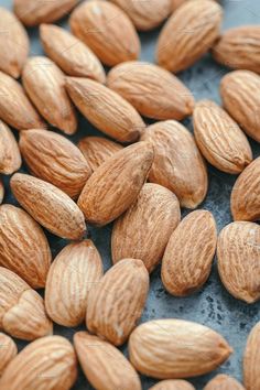 almonds on a baking sheet ready to be cooked