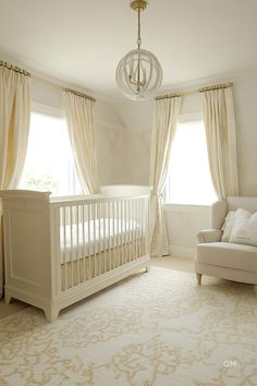 Elegant neutral nursery with white crib, cozy nursing chair, and gold-accented decor. Perfect for nursery inspo and nursery design neutral themes. Practical Nursery, Busy Parents