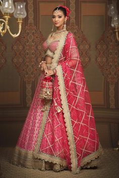 Rani pink cotton shimmer chanderi lehenga with attached cancan, geometric patterns, intricate gota, dori and badla work and emerald green broad border. Comes with padded, gota work blouse and lace border net dupatta. - Aza Fashions Designer Pink Wedding Sets, Ceremonial Sets With Dupatta, Badla Work, Chanderi Lehenga, Rani Pink, Gota Work, Pink Lehenga, Net Dupatta, Lace Border