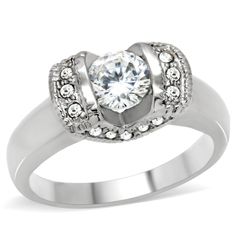 a white gold ring with diamonds on the sides and a center stone in the middle