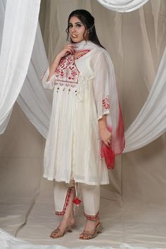 White angrakha style kurta with thread, sequin and tassel embroidered yoke in floral motifs. Paired with matching embroidered salwar, dupatta and slip. - Aza Fashions Traditional White V-neck Sets, White Cotton Silk Palazzo Set With Dabka Work, Traditional Sheer Dupatta, Festive White V-neck Kurta, White Salwar Kameez With Dupatta For Puja, White Anarkali Salwar Kameez For Puja, White Anarkali Kurta With V-neck, White V-neck Festive Kurta, Festive White V-neck Sets