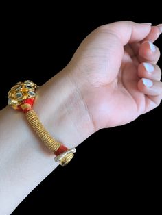 Kundan ponchi or bracelet One pair fits size 2.2&2.4 Made using Kundan and 22 carat gold plating l Adjustable Metal Temple Jewelry Bracelet, Adjustable Gold Plated Bracelet For Festive Occasions, Festive Adjustable Gold Bangle Bracelet, Adjustable Red Jewelry With Latkans, Temple Jewelry Cuff Bracelet As A Gift, Adjustable Fusion Bracelets For Ceremonial Occasions, Adjustable Fusion Bracelets For Ceremonial Use, Adjustable Ceremonial Fusion Bracelets, Ceremonial Fusion Adjustable Bracelets