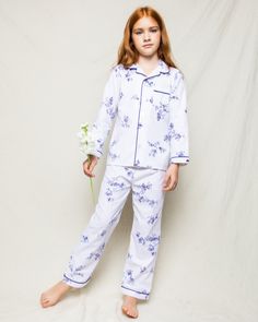 This delicate, vintage print evokes memories of spring mornings and the flowers climbing up the arbors. This classic pajama set is accented with navy piping and finished with pearl buttons. The sleepwear is made from the finest quality cotton and blended with just enough inherently flame retardant fiber to allow it to pass strict CPSC flame retardant laws without using harmful chemicals. The fabric is brushed for added softness, making the sleepwear feel absolutely luxurious, getting cozier afte Classic Cotton Sleepwear For Spring, Classic Sleepwear For Pajama Party In Spring, White Classic Sleepwear For Spring, Classic Spring Sleepwear For Bedtime, Classic Spring Sleepwear With Relaxed Fit, Classic Long Sleeve Sleepwear For Spring, Floral Pajama Set, Indigo Floral, Luxury Sleepwear