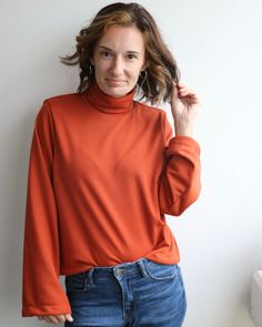 The Sarah Wide Sleeve Sweater is the comfy, go-to sweater you will want to live in every day! This pattern is sure to be a new favorite in your wardrobe. It is easy to make, stylish, and perfect for cozy days at home and days out on the town.The design features 4 neckline options, a loose oversized fit and wide sleeves with different finishes.It is accessible to beginners, with photo instructions and a video tutorial included to aid in the sewing process.This pattern features: 4 Necklines: Crew Fall Everyday Turtleneck Tops, Comfortable Stretch Sweater For Fall, Fall Relaxed Fit Knit Top, Cozy Soft Knit Tops For Workwear, Cozy Soft Knit Tops For Work, Comfortable Long Sleeve Fall Tops, Comfortable Long Sleeve Tops For Fall, Knit Tops For Fall Layering, Cozy Fit Knit Tops For Fall