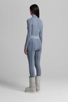 PRESALE: THIS STYLE SHIPS NOVEMBER 1 Textural vertical rib and shape wear construction complement physique while fitting flawlessly under ski suits. Top and bottom sold separately. Fitted Full-length Winter Activewear, Fitted Full Length Winter Activewear, Ribbed Fitted Bottoms For Winter, Ribbed Fitted Athleisure Activewear, Fitted Blue Ribbed Activewear, Fitted Ribbed Blue Activewear, Winter Fitted Unitard, Fitted Ribbed Elastane Activewear, Winter Ribbed High-stretch Activewear