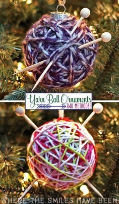 yarn ball ornaments hanging from a christmas tree with pins and needles attached to the balls