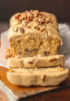 a loaf of cake sitting on top of a wooden cutting board