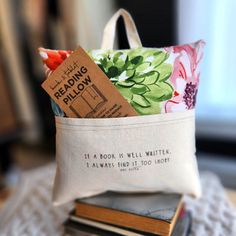 a book is sitting in a bag on a table