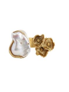 a pair of gold and white pearl earrings on a white background with an image of the shell