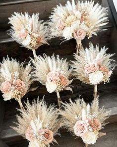 flowers and feathers are arranged on the stairs