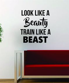 a wall decal with the words look like a beauty train like a beast on it