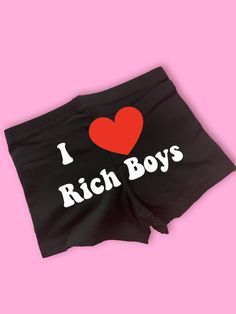 I Love Rich Boys Booty Shorts | Custom Bike Shorts | Y2K Shorts | Cute Shorts | Funny Shorts | Y2K Bike Shorts | Lounge Shorts | Comfy Shorts to Lounge in! Actual item may be lighter/darker than pictured. M A T E R I A L S - 95% Cotton / 5% Spandex - Thick and Heavy Stretch Fit - Available In Sizes S-3XL S I Z I N G - Size chart is available on our listing photos. S H I P P I N G  &  P R O D U C T I O N  T I M E - Production Time is 5 Business Days. (May be delayed during the Holiday Season) - S Shorts With Writing On The Back, Shorts With Words On Back, Aesthetic Loungewear, Silly Shirt, Shorts Comfy, Funny Shorts, Rich Boy, Shorts Y2k, Kawaii Shirts