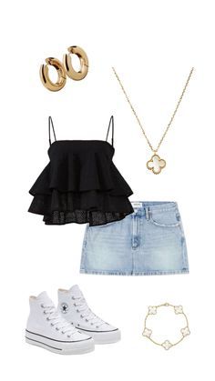 two pieces of clothing including a black top, denim skirt and white converse sneakers with gold accessories