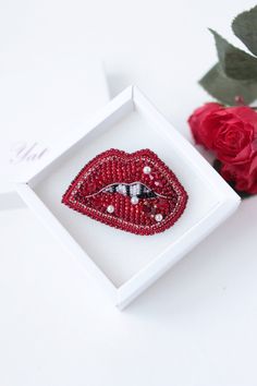 "Kiss me jewelry it is embroidered brooch by bead and gimp. Bridal Pin is a trendy item. Kiss me charm has a size 2.2*1.4 inches (5,5*3,5 cm). This lips wedding pin can be made with different crystals or charms according to your order. Red lips brooch - kiss me jewelry with Czech crystal beads. It will perfectly complement your unique jewelry collection or will be a wonderful gift for a special person. It can be used as a bridal brooch. Looks very elegant! Kiss brooch is carefully bead embroider Red Enamel Brooch Pin For Gift, Red Brooch Jewelry For Valentine's Day, Red Valentine's Day Brooch, Red Brooches For Valentine's Day, Red Brooch Pins For Valentine's Day, Trendy Brooch Jewelry For Gift, Valentine's Day Gift Brooch Pins, Valentine's Day Party Brooch Jewelry, Red Rhinestone Brooches For Gifts